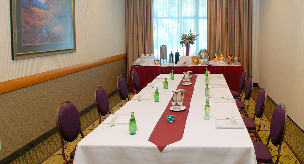 Conference room set up with food and refreshments at Holiday Inn North Vancouver